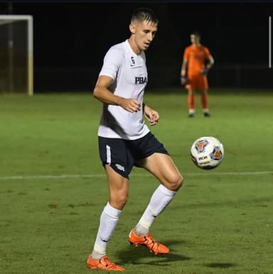 Rob Tomlin playing college soccer for Palm Beach Atlantic